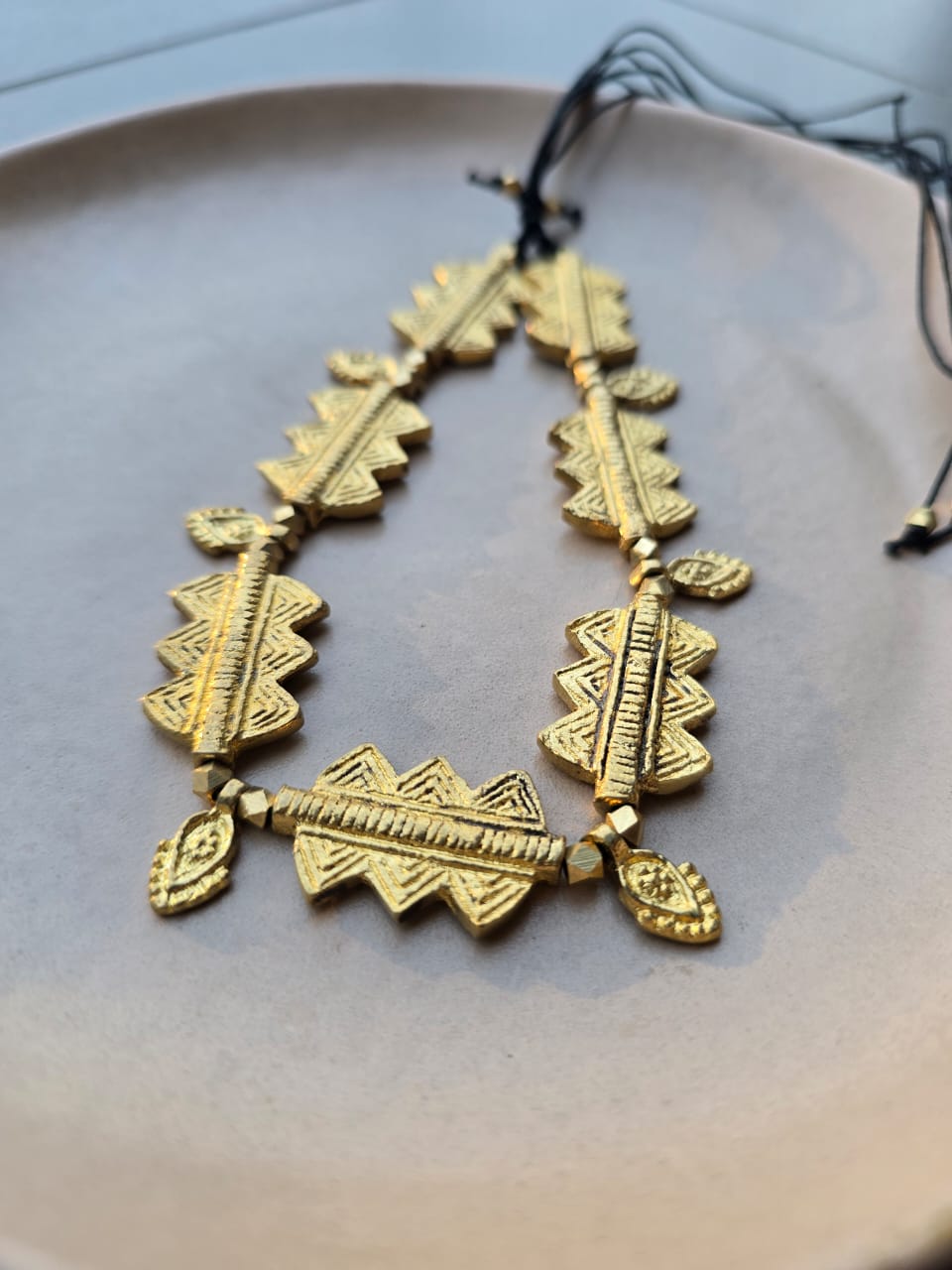 Sun-kissed brass choker