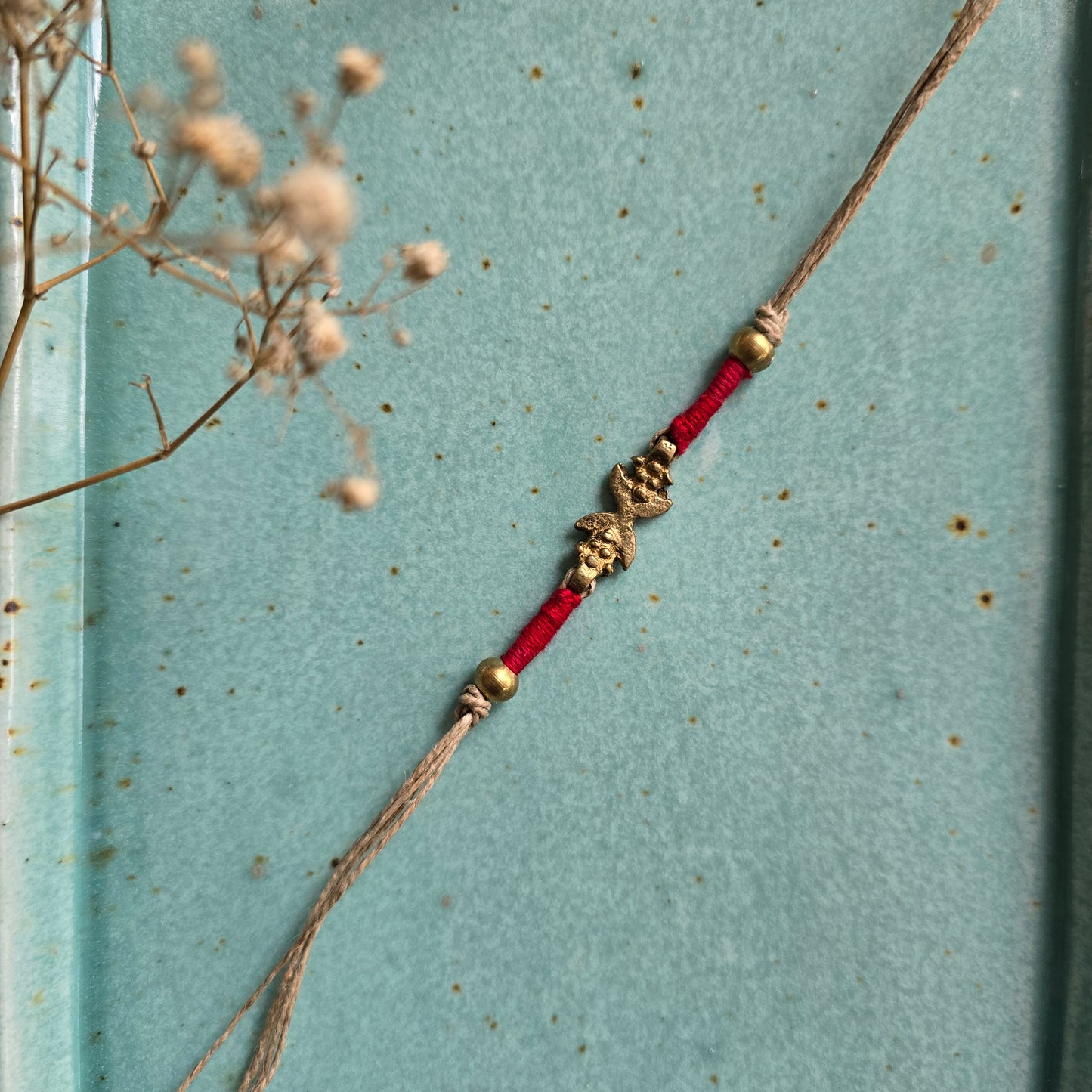 Brass Motif Rakhi