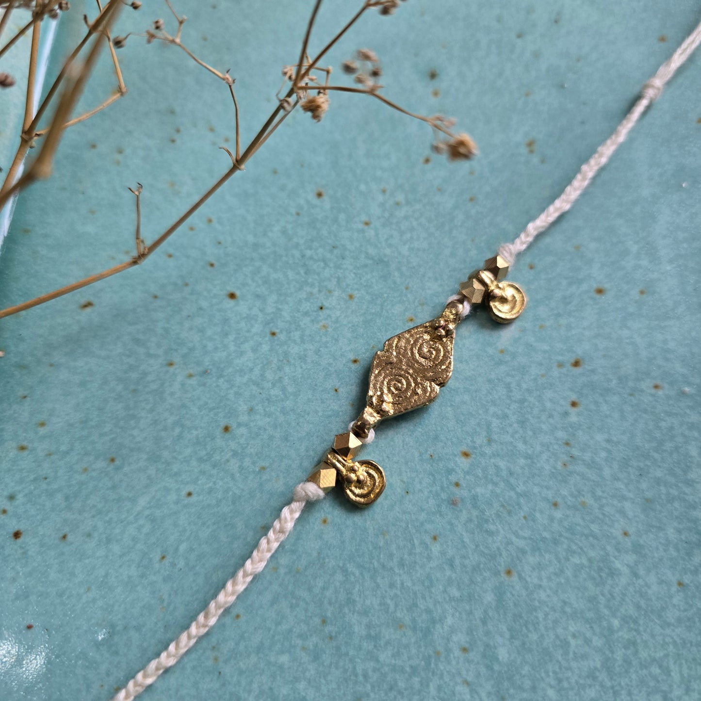 Brass Charms Rakhi - Set Of 3