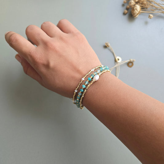 Aqua blue Onyx Lumba Bracelet with Brass Charms