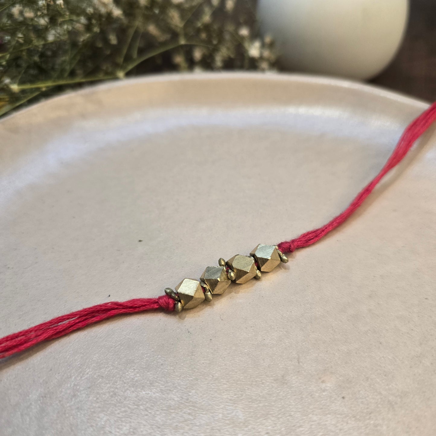 English color Brass rakhi