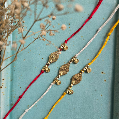 Brass Charms Rakhi - Set Of 3