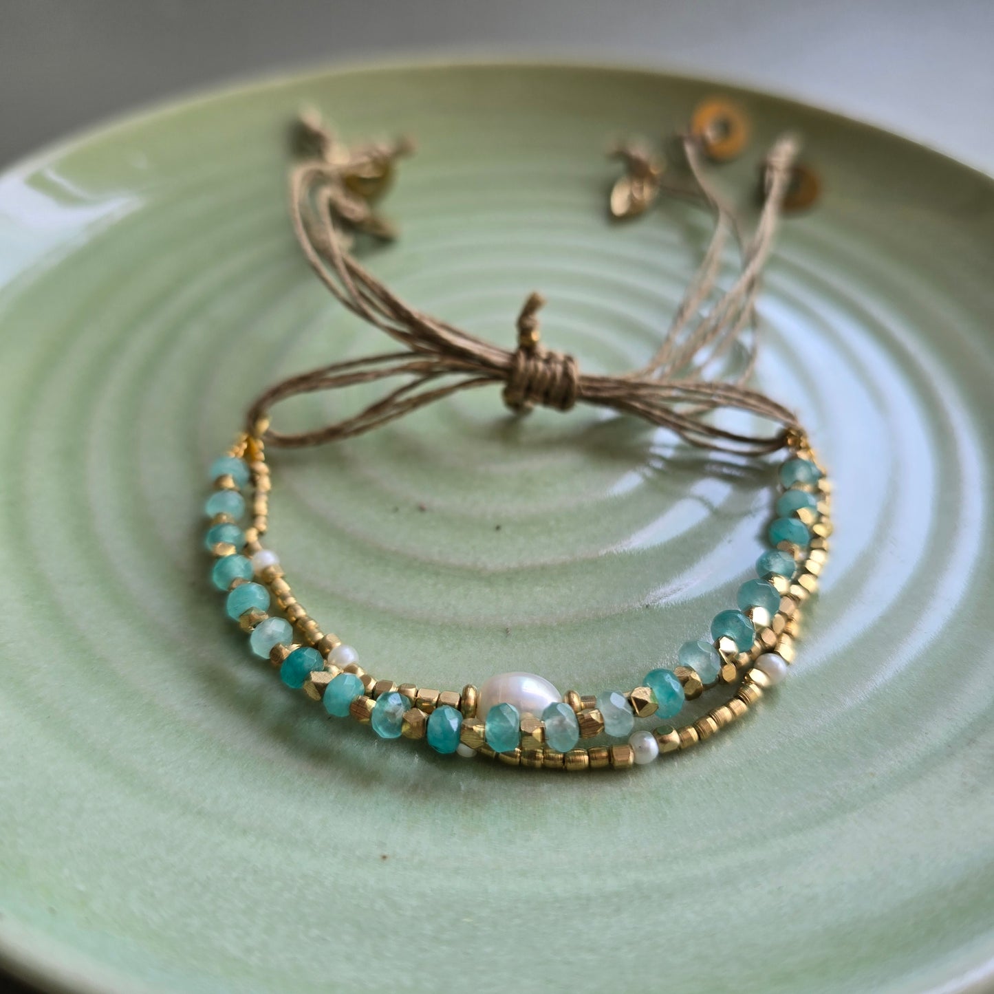 Aqua blue Onyx Lumba Bracelet with Brass Charms