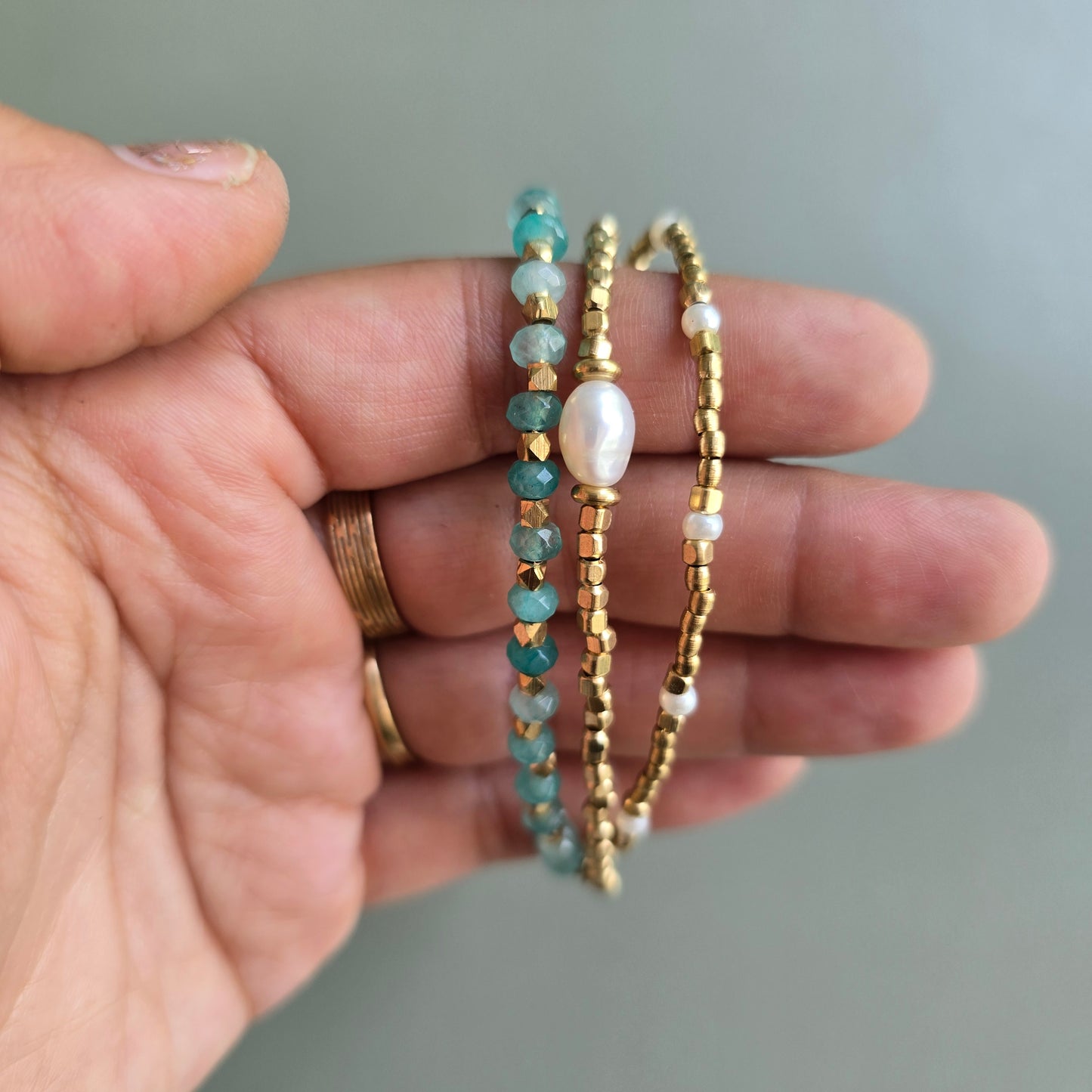 Aqua blue Onyx Lumba Bracelet with Brass Charms