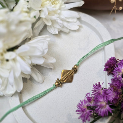 Diamond Brass Bead Rakhi - english color