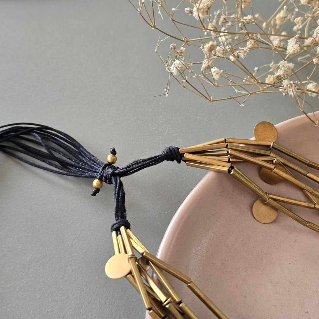 Brass tube necklace with discs