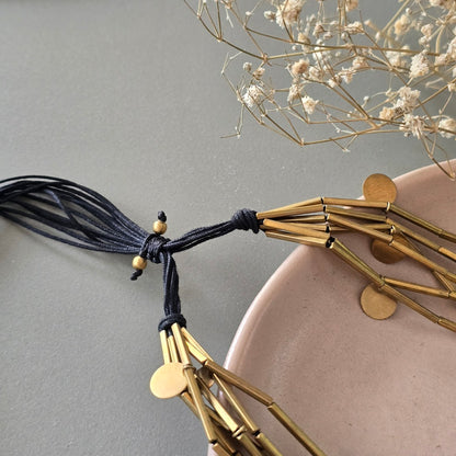 Brass tube necklace with discs