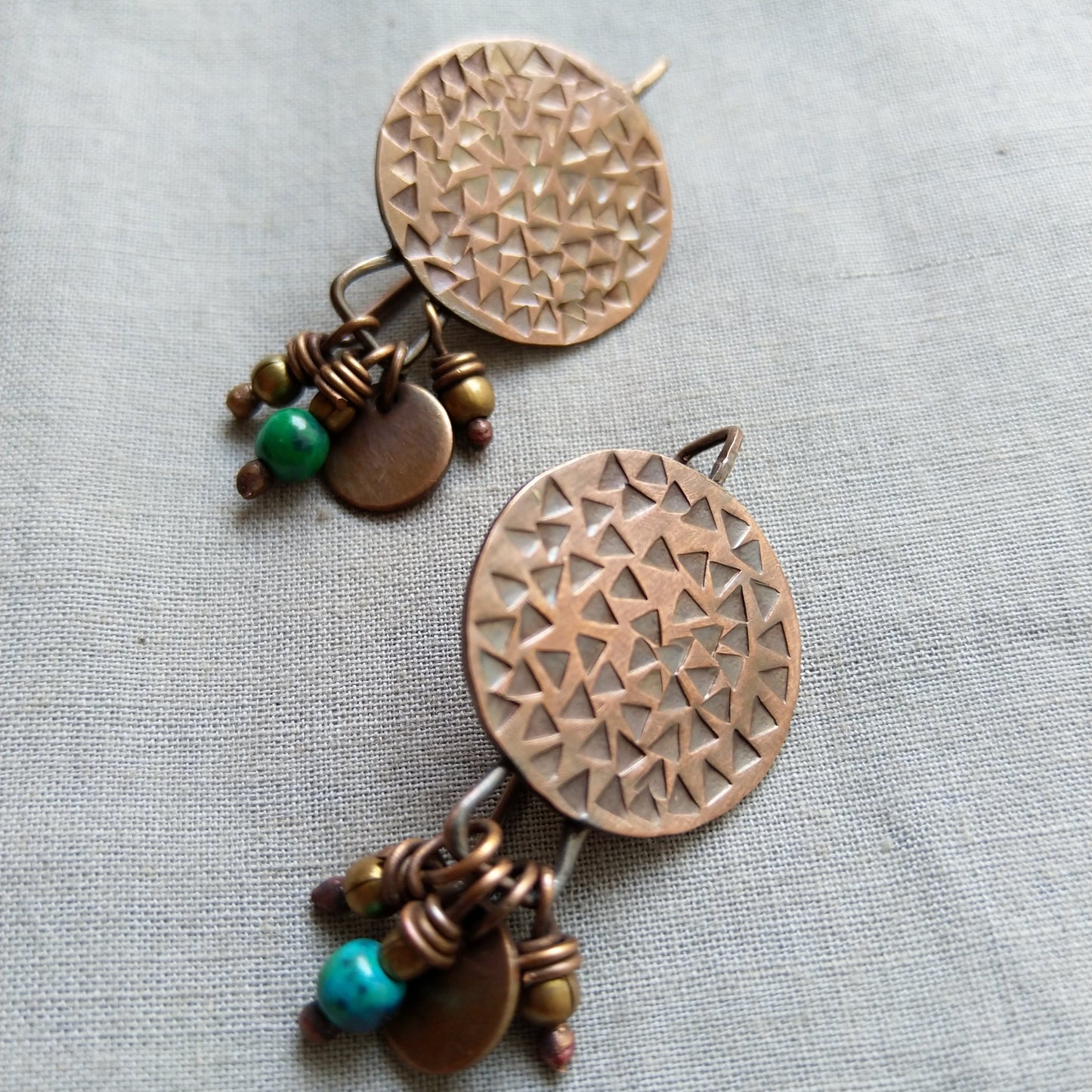 Circular copper disc earrings with danglings