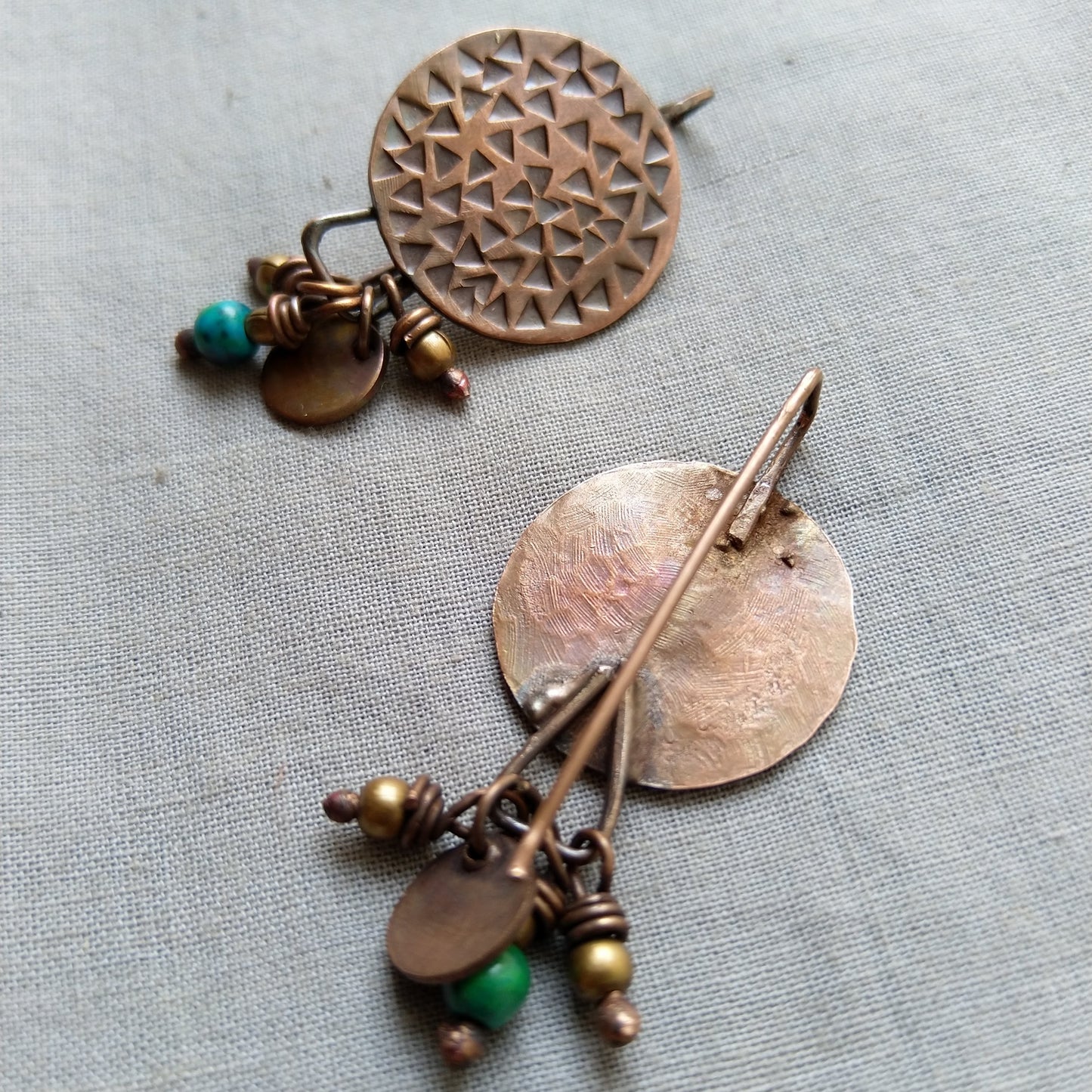 Circular copper disc earrings with danglings