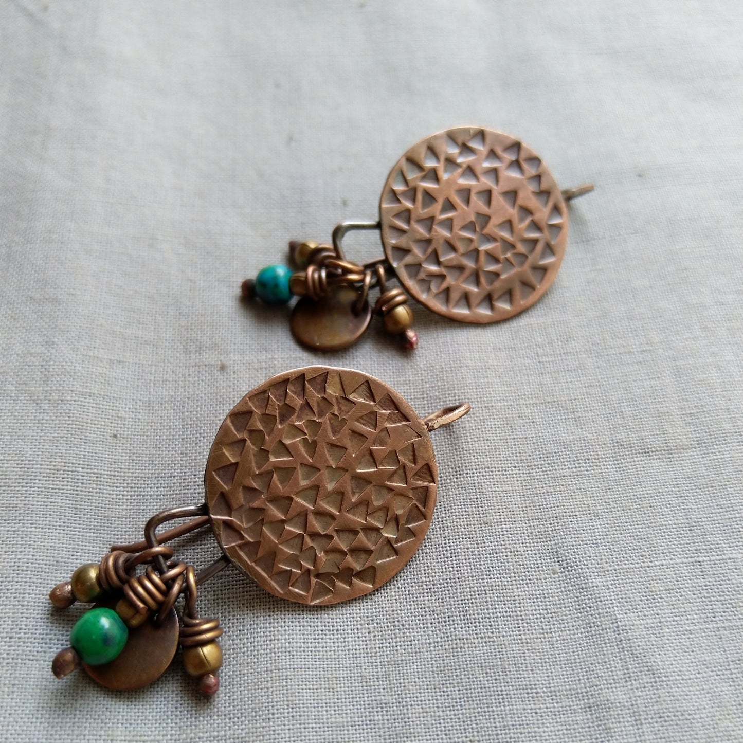 Circular copper disc earrings with danglings