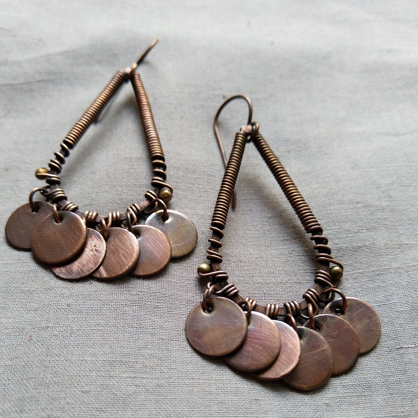 Drop shaped circular disc earrings