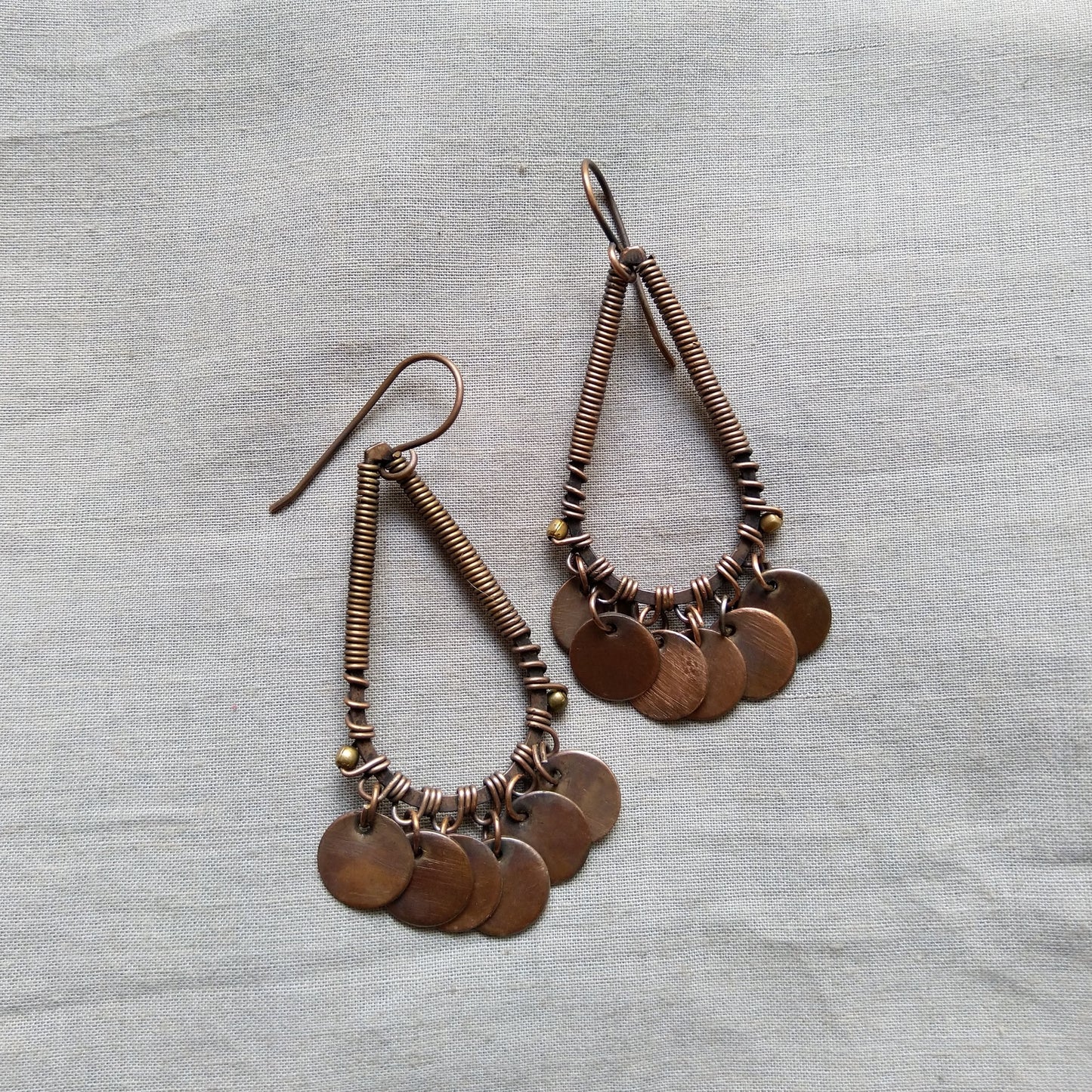 Drop shaped circular disc earrings