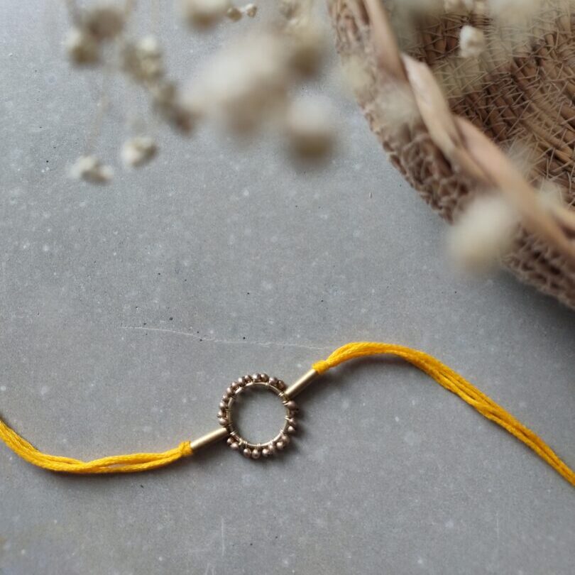 Circle Of Life Rakhi - Yellow