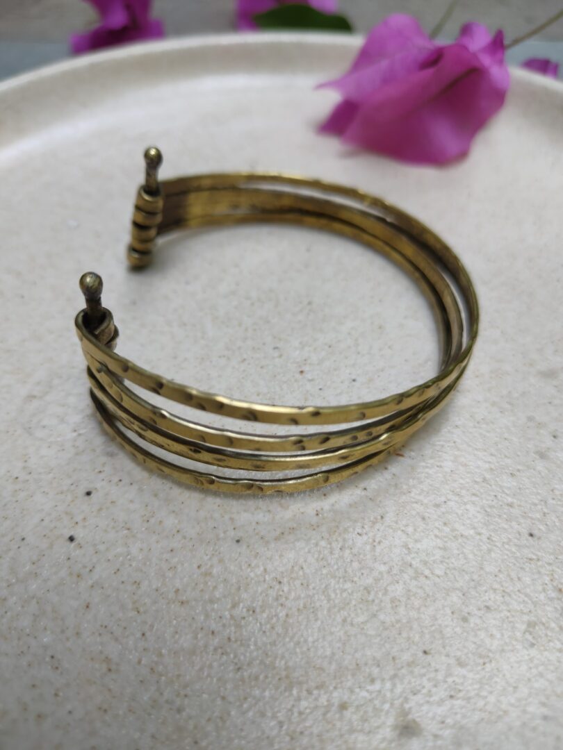 Stacked brass bangles