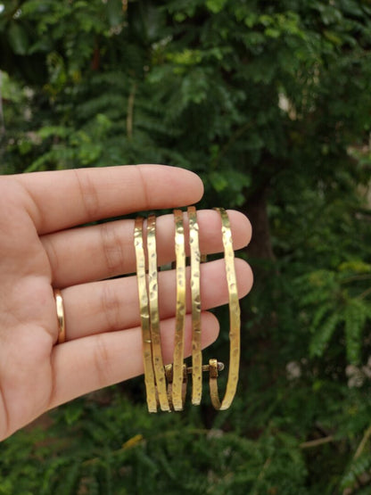 Stacked brass bangles