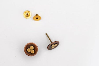 Mixed metal studs with three circles