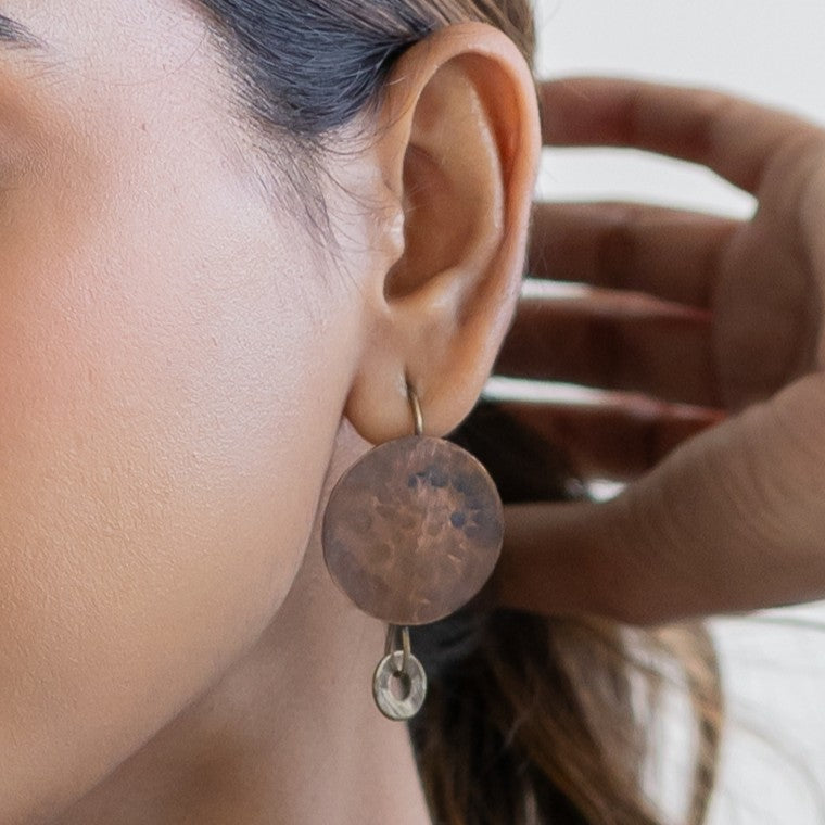Hammered copper hooks with brass discs