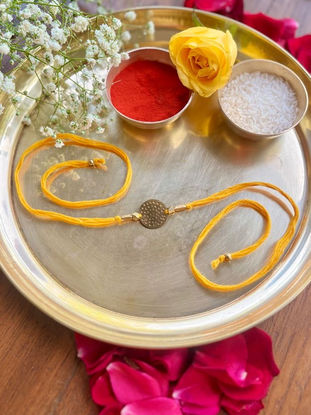 Circular Hammered Brass Rakhi