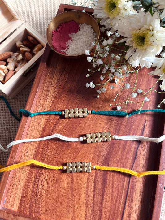 Trinity Gold Rakhi