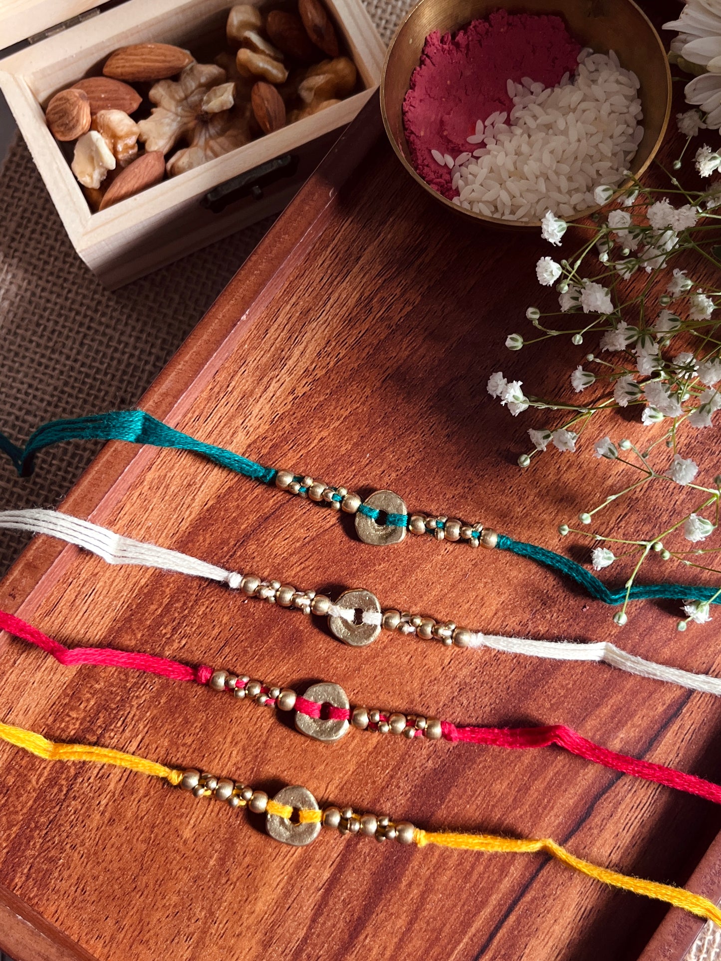 The Organic Brass Charm Rakhi