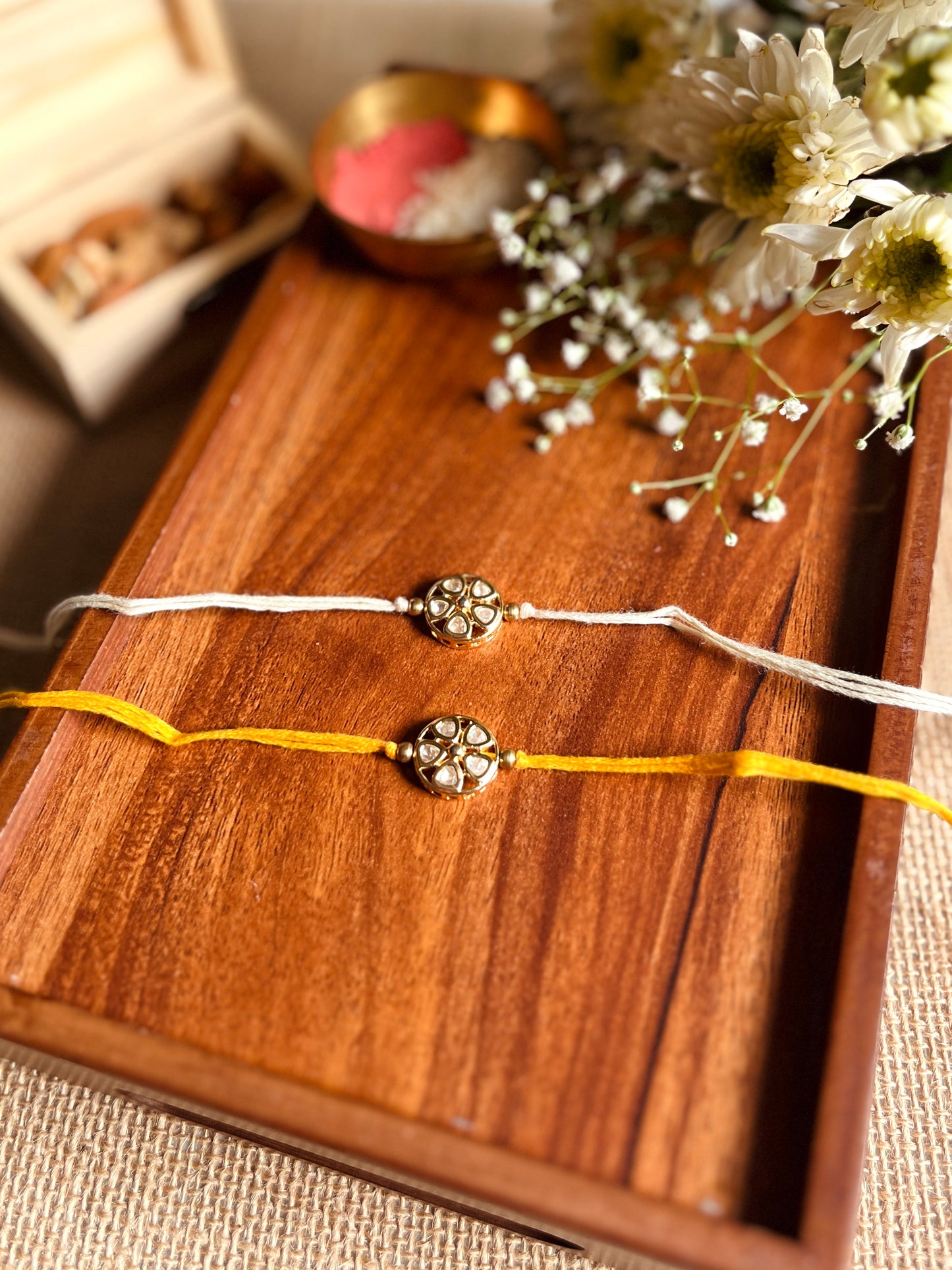Floral Kundan Brass Rakhi