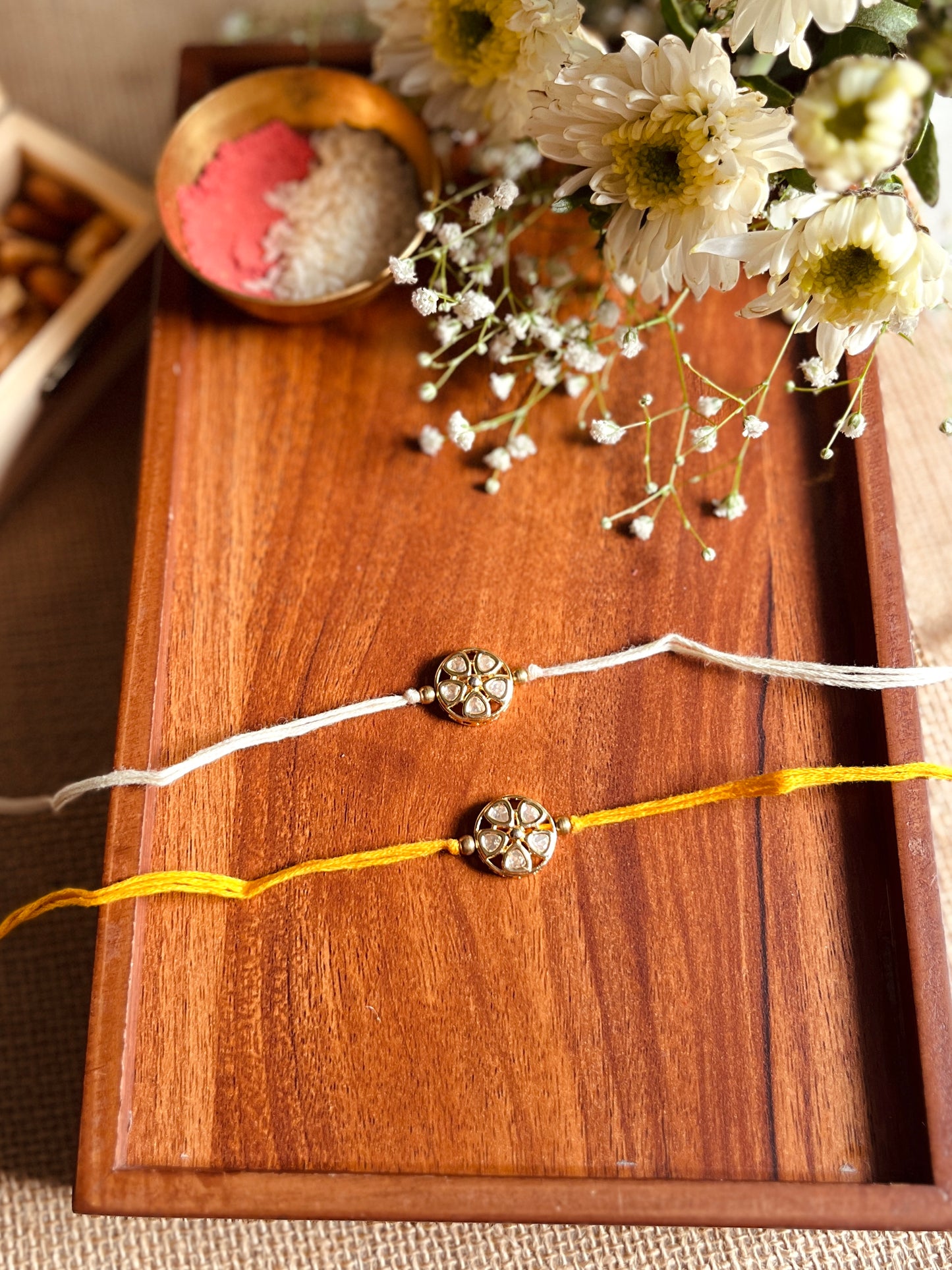 Floral Kundan Brass Rakhi