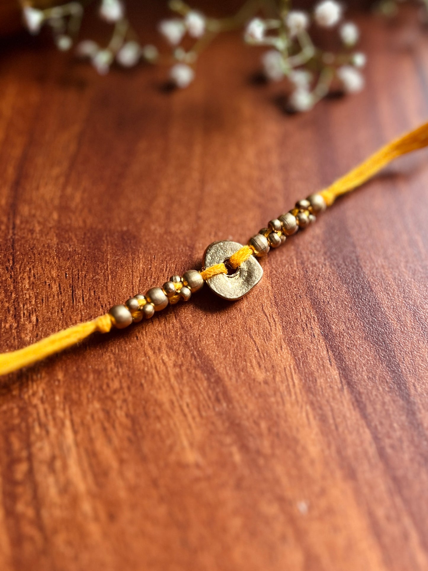 The Organic Brass Charm Rakhi