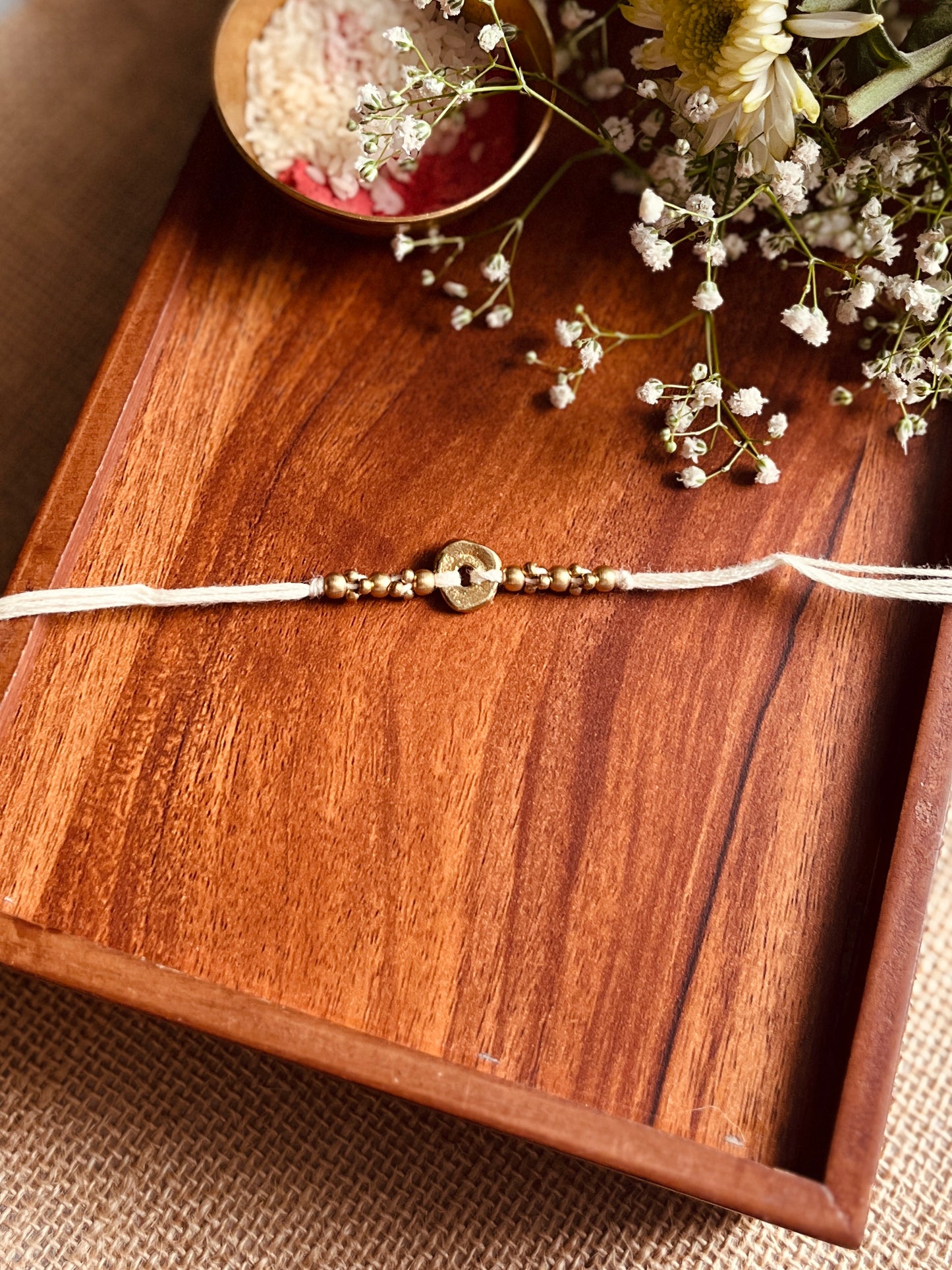 The Organic Brass Charm Rakhi