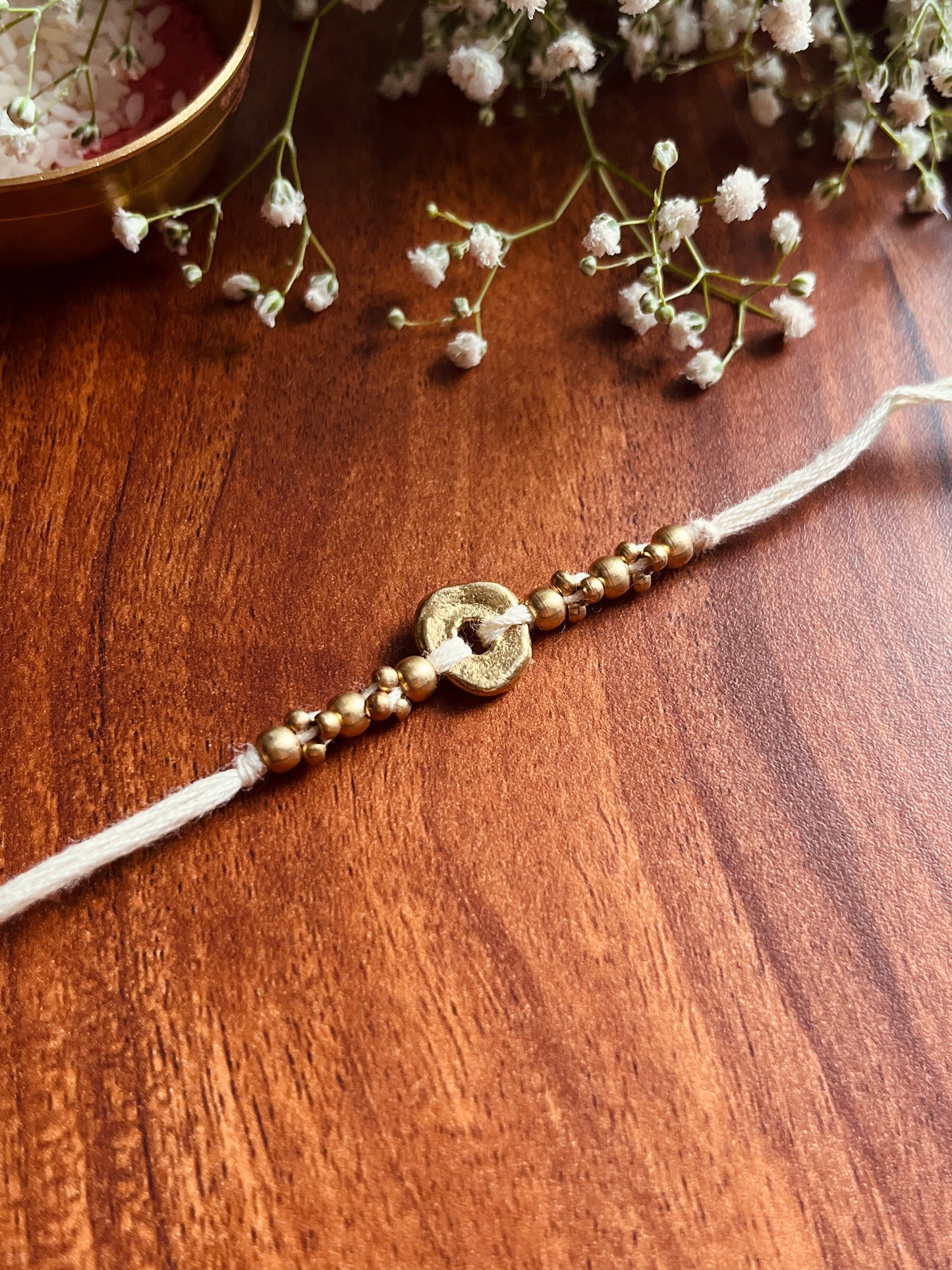 The Organic Brass Charm Rakhi
