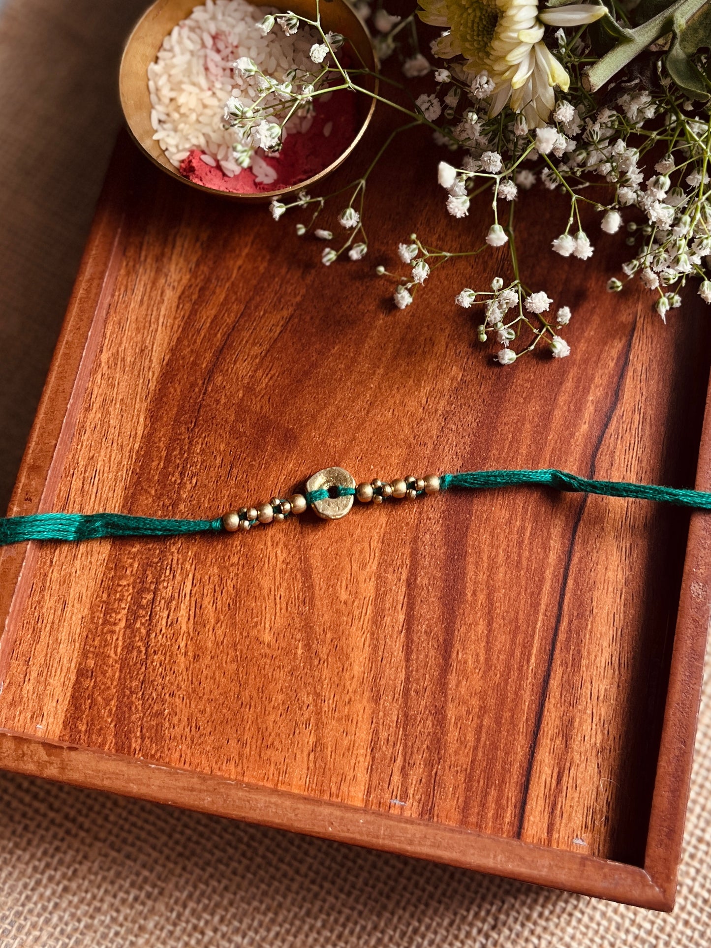 The Organic Brass Charm Rakhi