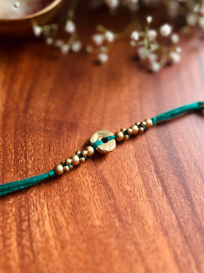 The Organic Brass Charm Rakhi