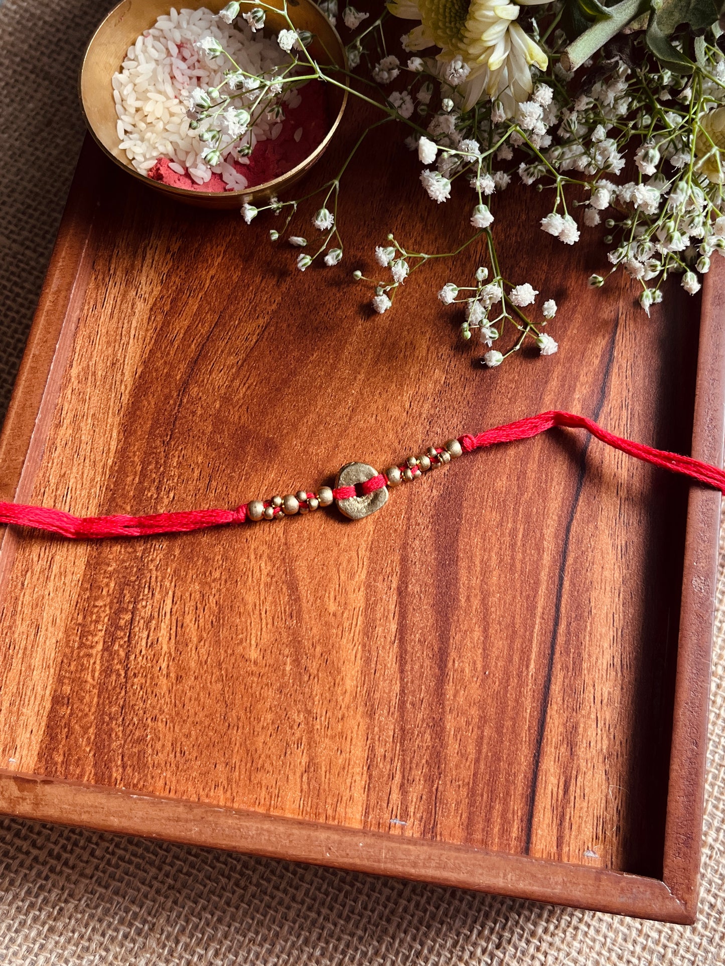 The Organic Brass Charm Rakhi