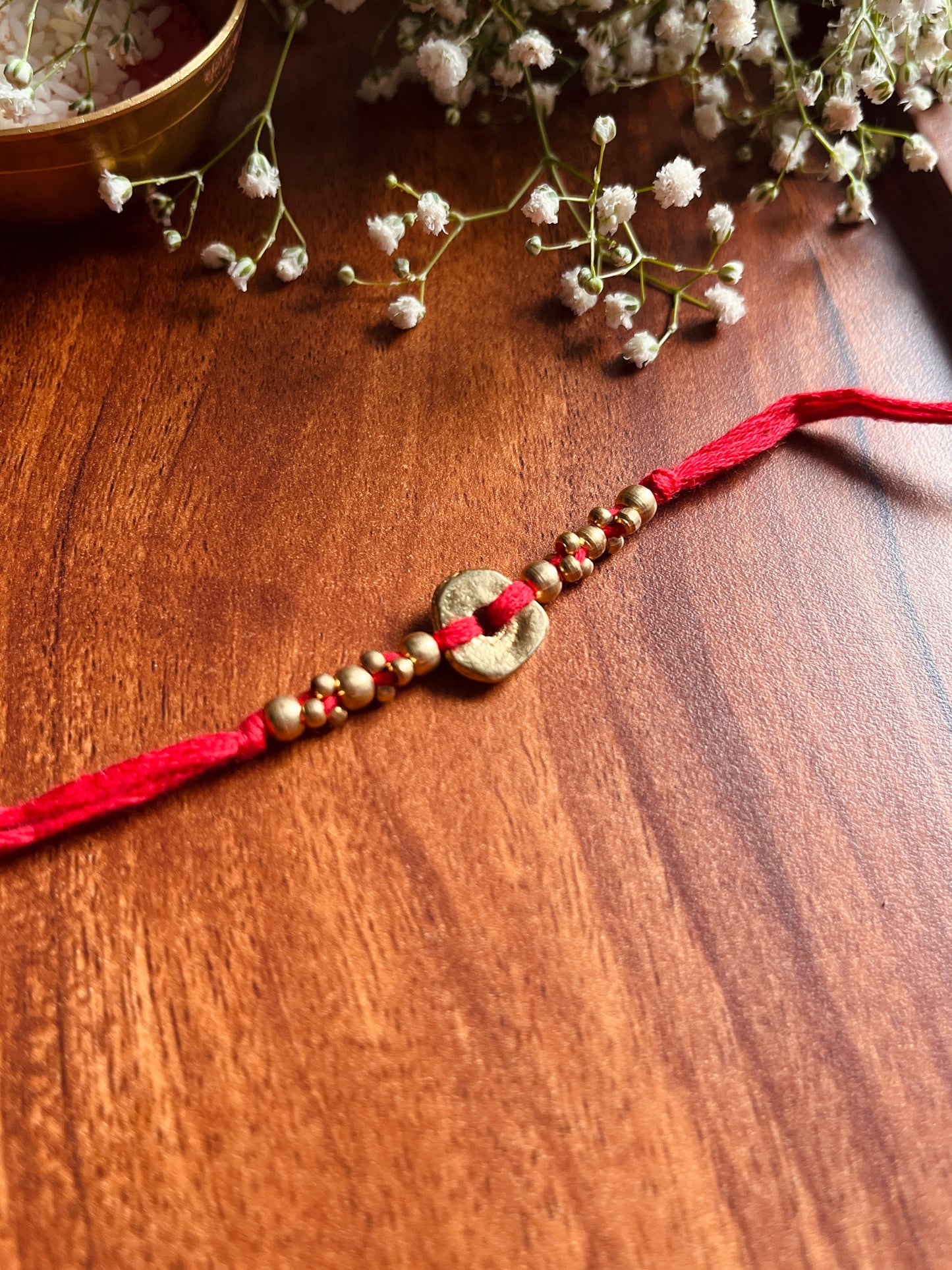 The Organic Brass Charm Rakhi