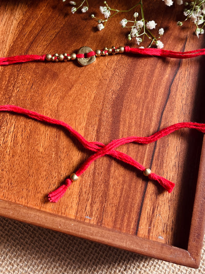 The Organic Brass Charm Rakhi