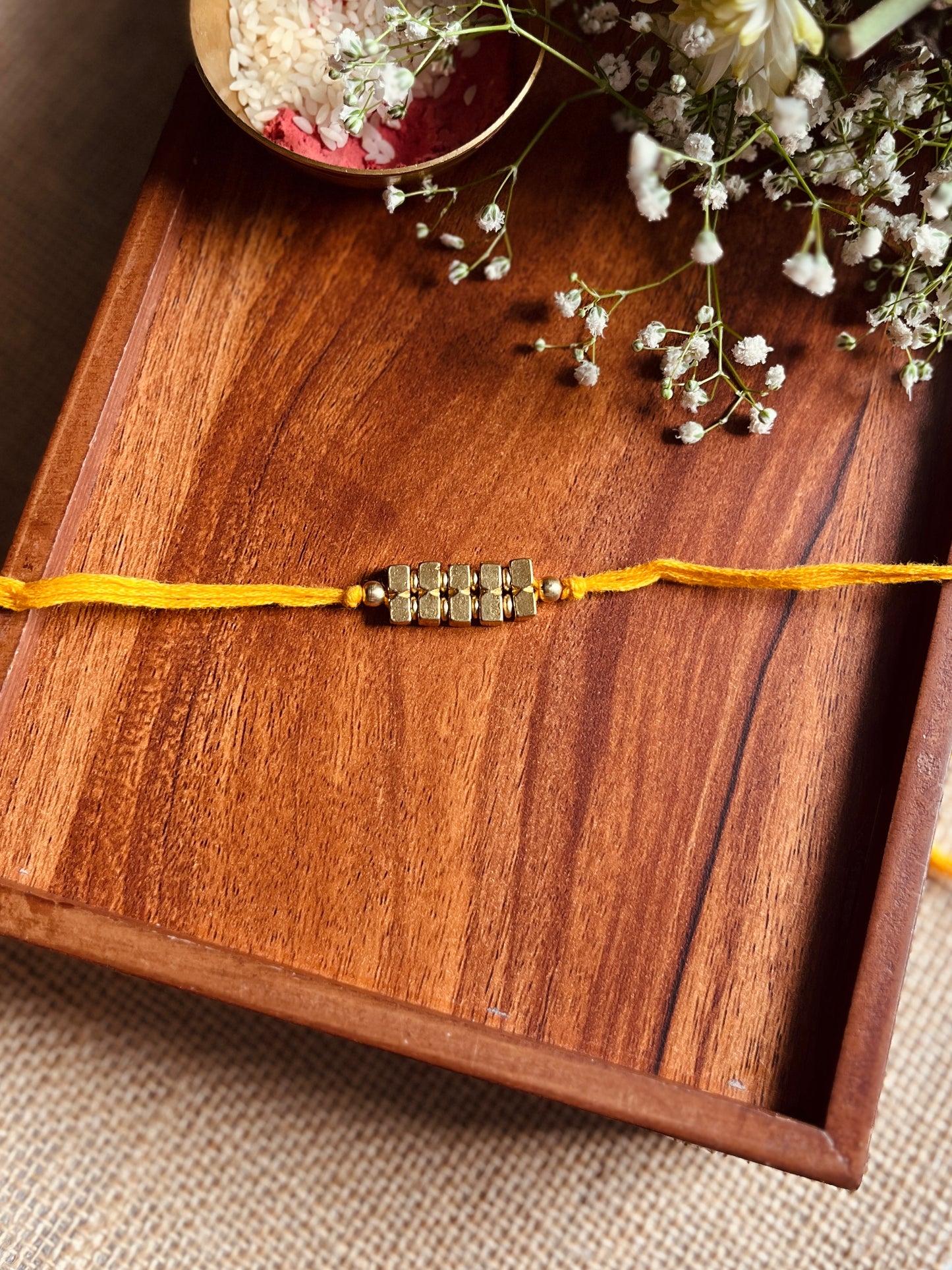Trinity Gold Rakhi