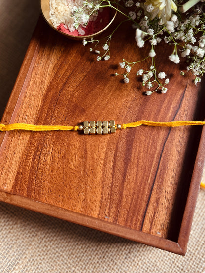 Trinity Gold Rakhi