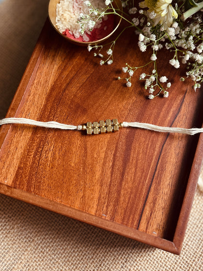 Trinity Gold Rakhi