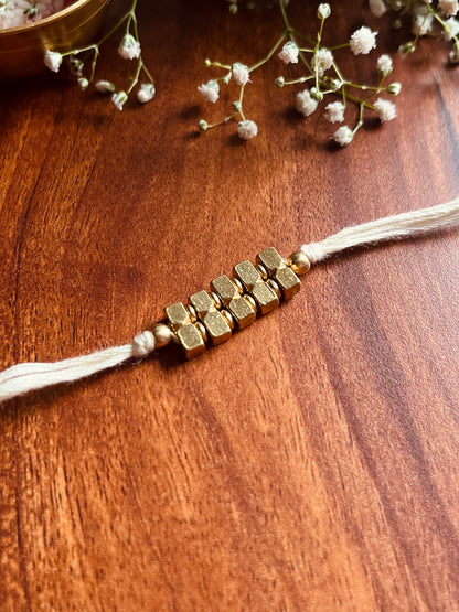 Trinity Gold Rakhi