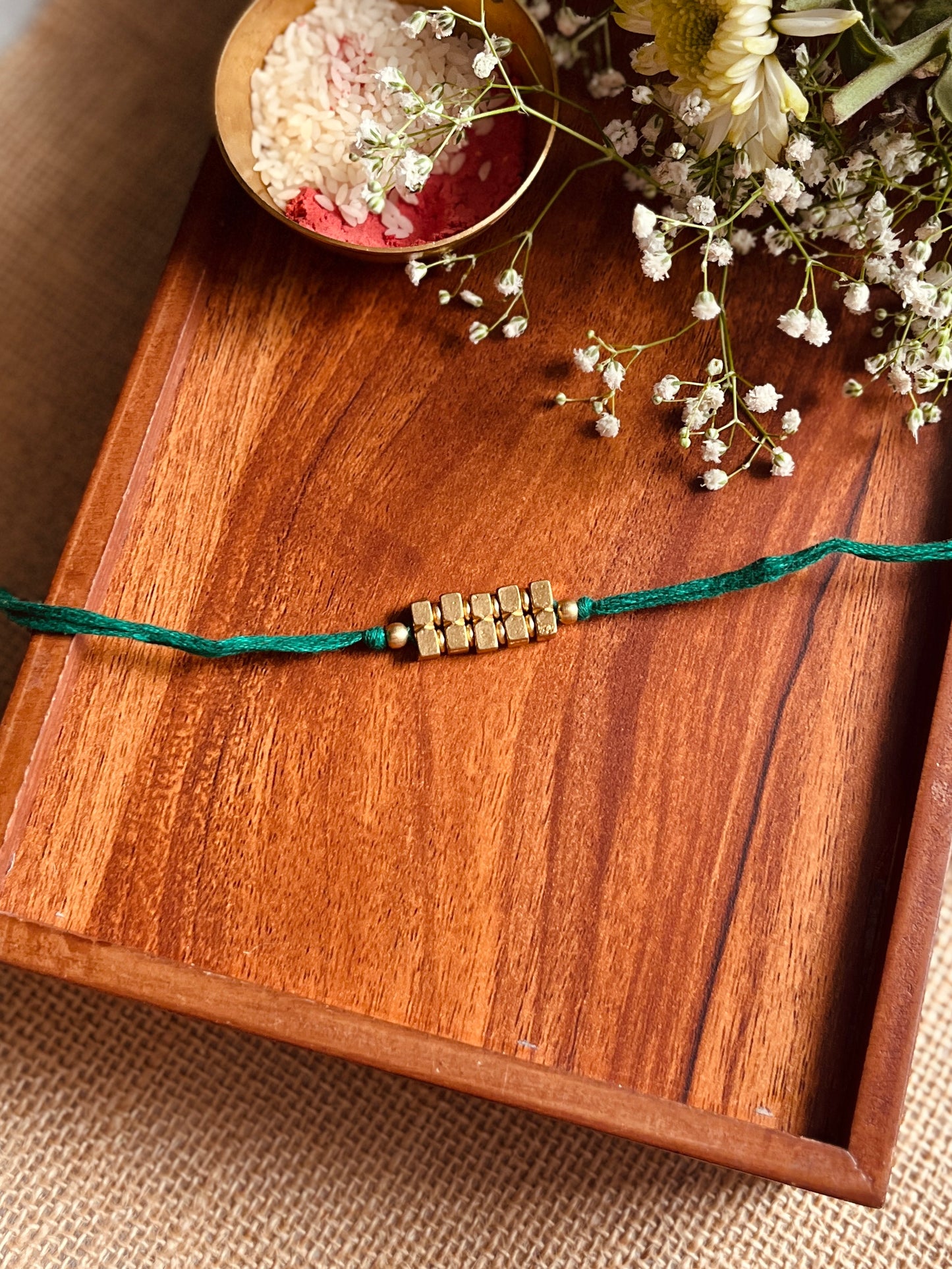 Trinity Gold Rakhi