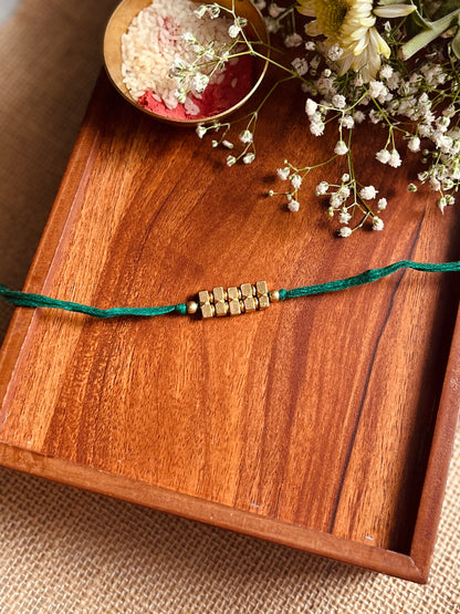 Trinity Gold Rakhi