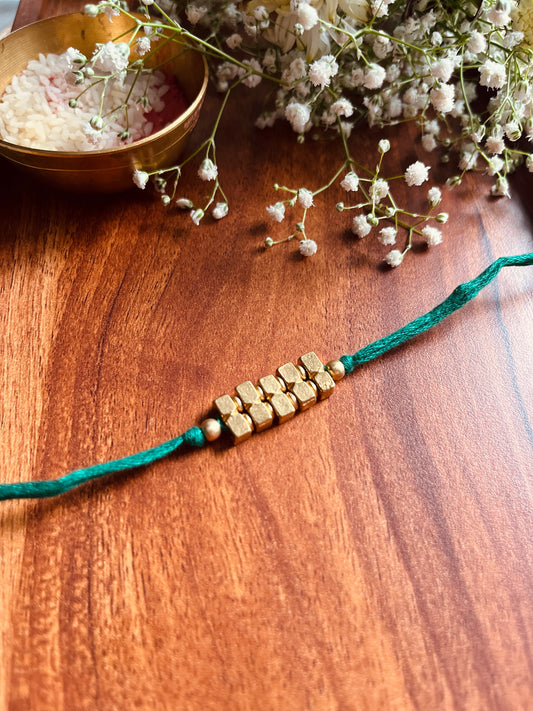 Trinity Gold Rakhi