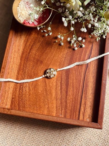 Floral Kundan Brass Rakhi