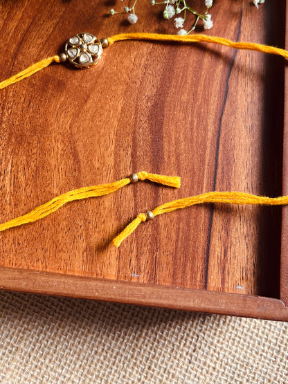 Floral Kundan Brass Rakhi