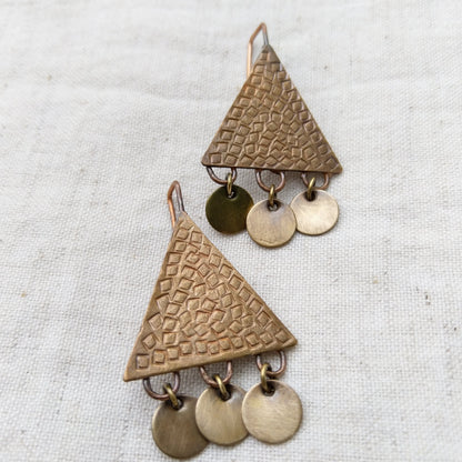 Triangular copper earrings with square texture