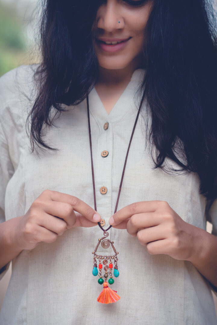 triangular peach tassel necklace