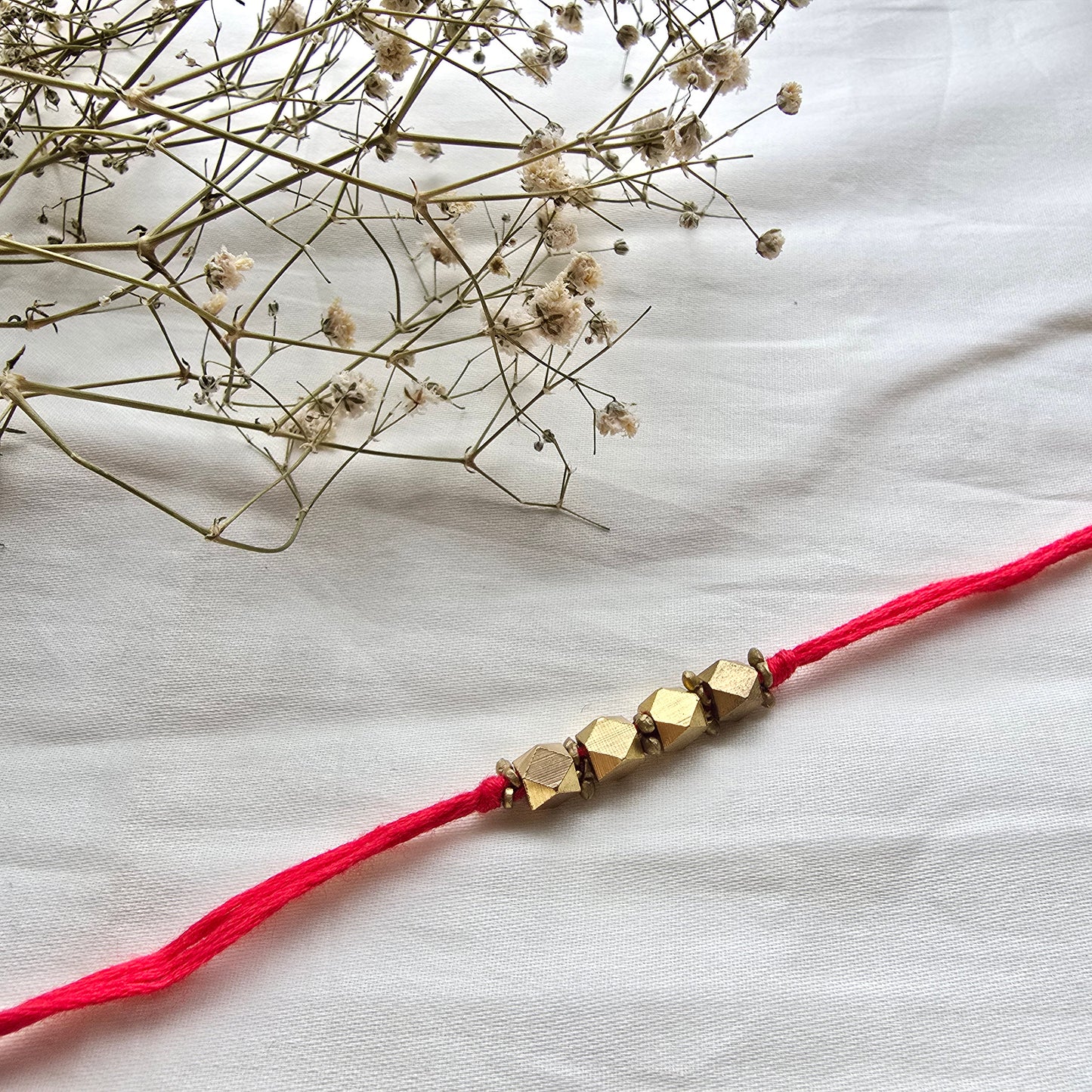 4 Beads Brass rakhi - english colors
