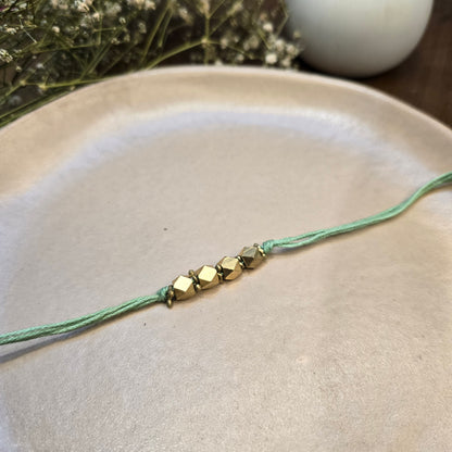 English color Brass rakhi