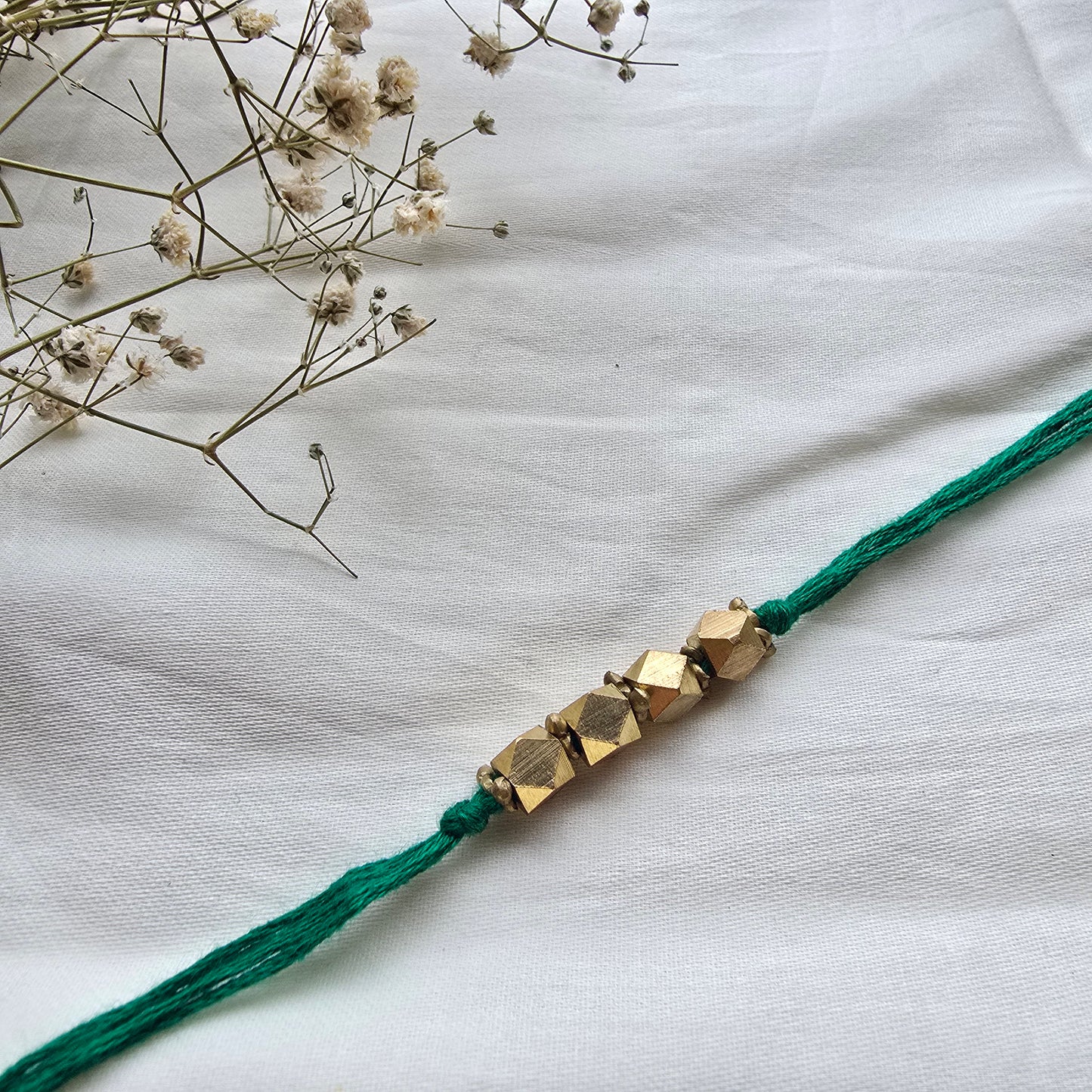 4 Beads Brass rakhi - english colors