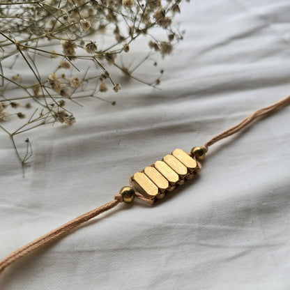 Rectangle Brass Beads Rakhi - english color