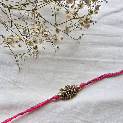 Zarna Brass Beads Rakhi - English colors